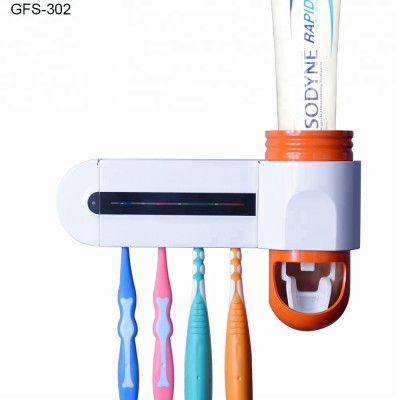 Small gift  UV toothbrush sterilizer and toothpaste dispenser ,sanitizing rate 99.9%, WOWER dental care sterilizer kit